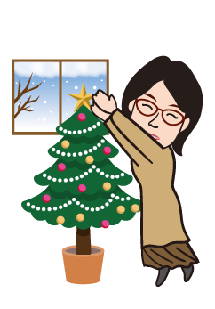 クリスマスツリーに飾りつけをする田母神理事